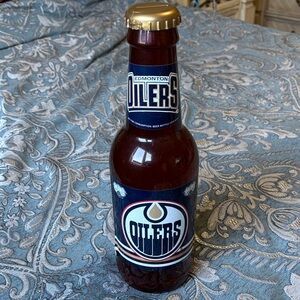 NHL Edmonton Oilers Brown Bottle with Gold Cap Coin Bank